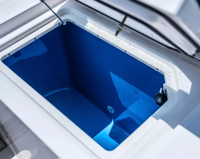 Yacht Photos Pics Open storage compartment on 2018 Everglades 435 Center Console boat.