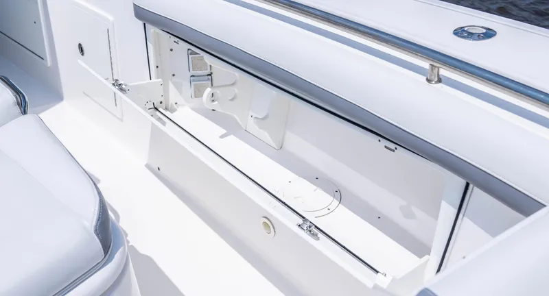  Yacht Photos Pics Open storage compartment on 2018 Everglades 435 Center Console boat.
