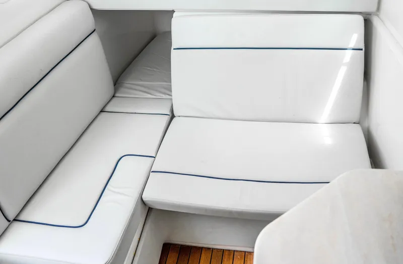  Yacht Photos Pics White seating area on 2018 Everglades 435 Center Console boat interior.