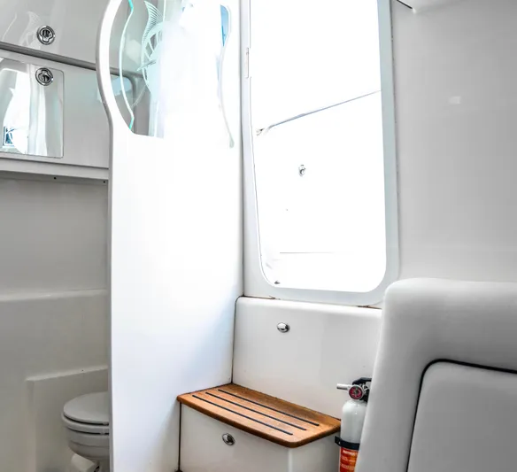  Yacht Photos Pics Interior of 2018 Everglades 435 Center Console boat bathroom with modern fixtures.