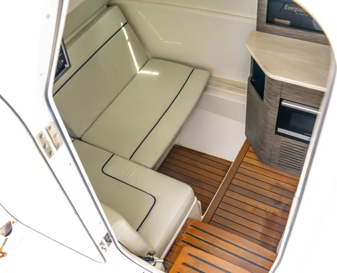  Yacht Photos Pics Interior of 2018 Everglades 435 Center Console with seating and wood flooring.