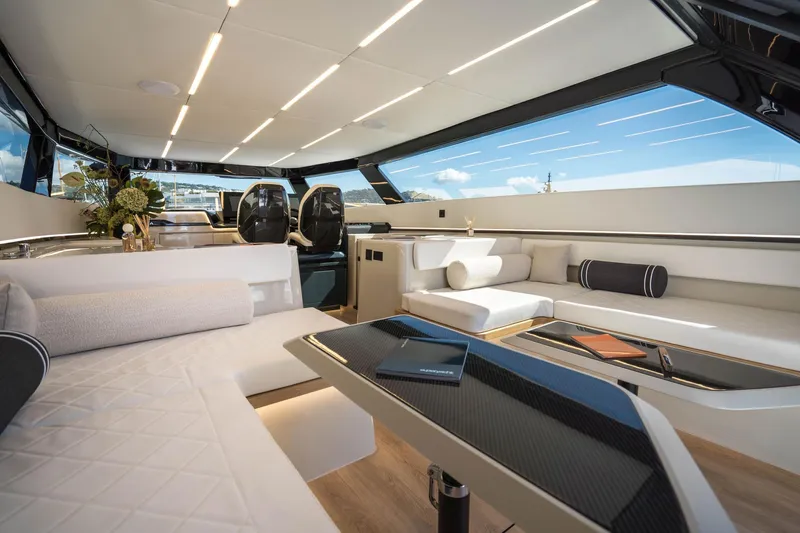 R2d2 Yacht Photos Pics Luxurious interior of 2025 Sunreef 55 Ultima yacht with modern seating and sleek design.