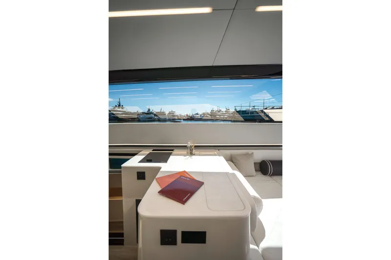 R2d2 Yacht Photos Pics Interior view of 2025 Sunreef 55 Ultima yacht with large window and modern design.