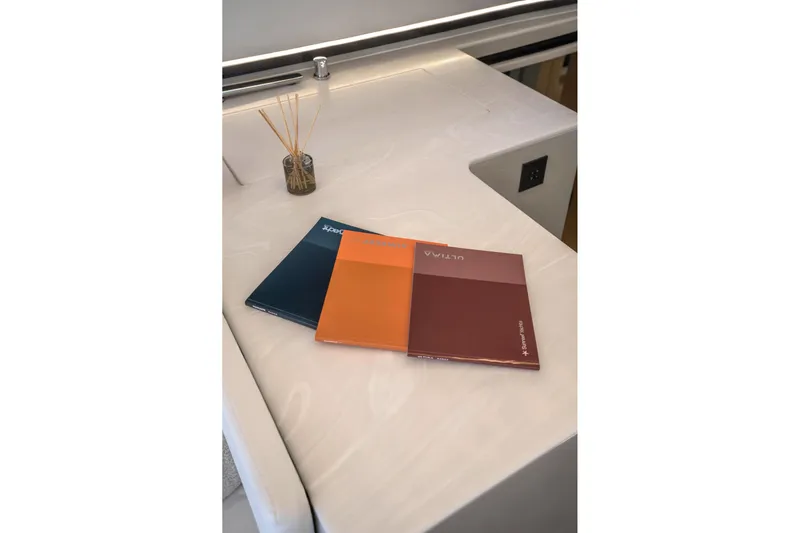 R2d2 Yacht Photos Pics Brochures on a Sunreef 55 Ultima 2025 yacht's elegant countertop.