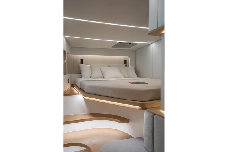 R2d2 Yacht Photos Pics Luxurious interior cabin of 2025 Sunreef 55 Ultima yacht with modern design and cozy bed.