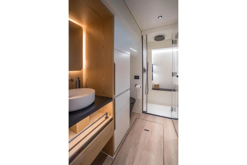 R2d2 Yacht Photos Pics Luxurious bathroom interior of 2025 Sunreef 55 Ultima yacht with modern fixtures.