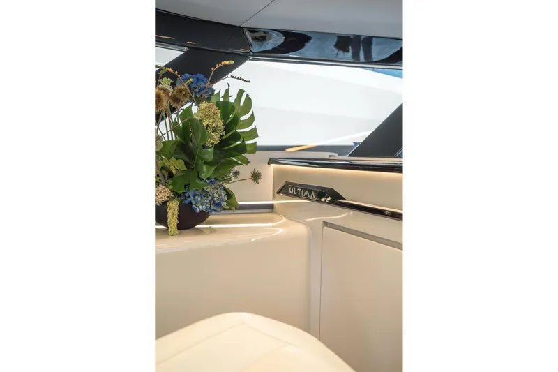 R2d2 Yacht Photos Pics Luxurious interior of 2025 Sunreef 55 Ultima yacht with elegant floral arrangement.