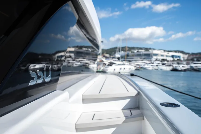 R2d2 Yacht Photos Pics 2025 Sunreef 55 Ultima yacht docked, showcasing sleek design and luxury features.