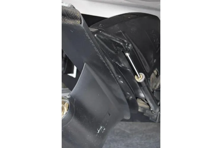  Yacht Photos Pics Close-up of 2015 Regal 32 Express boat's outdrive component, showcasing mechanical details.