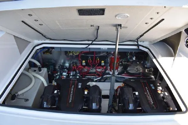  Yacht Photos Pics Engine compartment of 2015 Regal 32 Express boat, showcasing dual Volvo Penta engines.