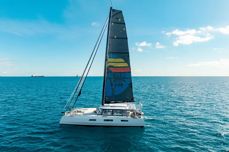 Crux Yacht Photos Pics 2017 Harvey Yachts 58 sailing on open ocean under clear blue sky.