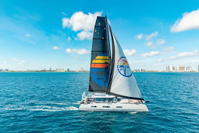 Crux Yacht Photos Pics Sailing yacht Harvey Yachts 58 (2017) cruising on blue ocean under clear sky.