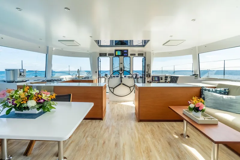 Crux Yacht Photos Pics Luxurious interior of 2017 Harvey Yachts 58, featuring elegant decor and ocean views.