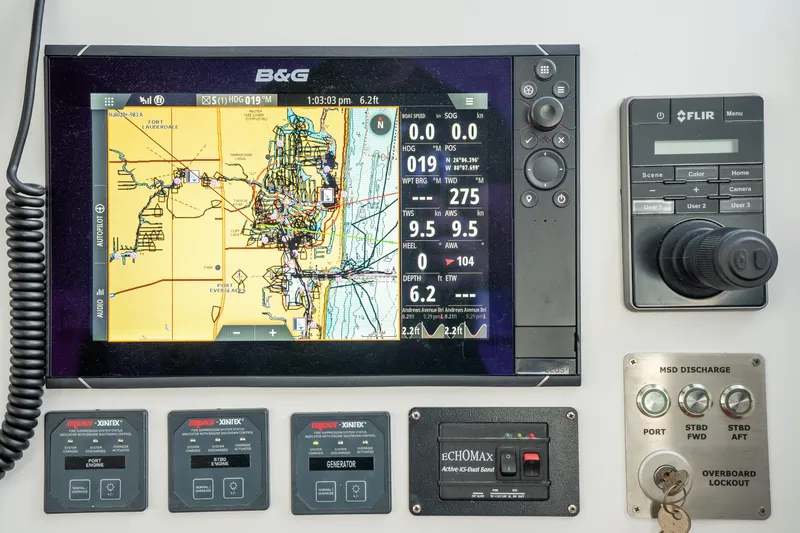 Crux Yacht Photos Pics Navigation and control panel of a 2017 Harvey Yachts 58, featuring B&G and FLIR systems.