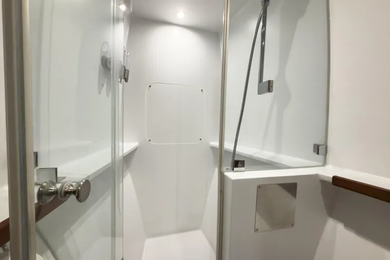 Crux Yacht Photos Pics Modern shower area in 2017 Harvey Yachts 58, featuring sleek design and glass door.