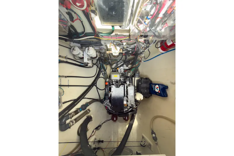 Crux Yacht Photos Pics Engine room of a 2017 Harvey Yachts 58, showcasing complex wiring and machinery.