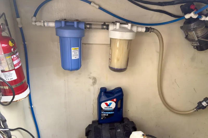 Crux Yacht Photos Pics Engine room of 2017 Harvey Yachts 58 with filters and fire extinguisher.