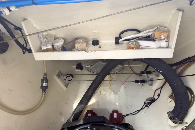 Crux Yacht Photos Pics Engine compartment of a 2017 Harvey Yachts 58, showing hoses and components.