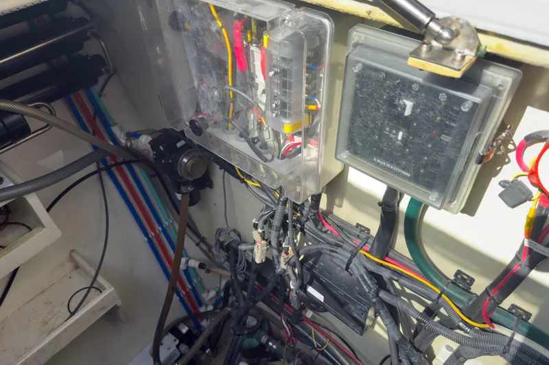 Crux Yacht Photos Pics Electrical system of a 2017 Harvey Yachts 58, showcasing wiring and components.