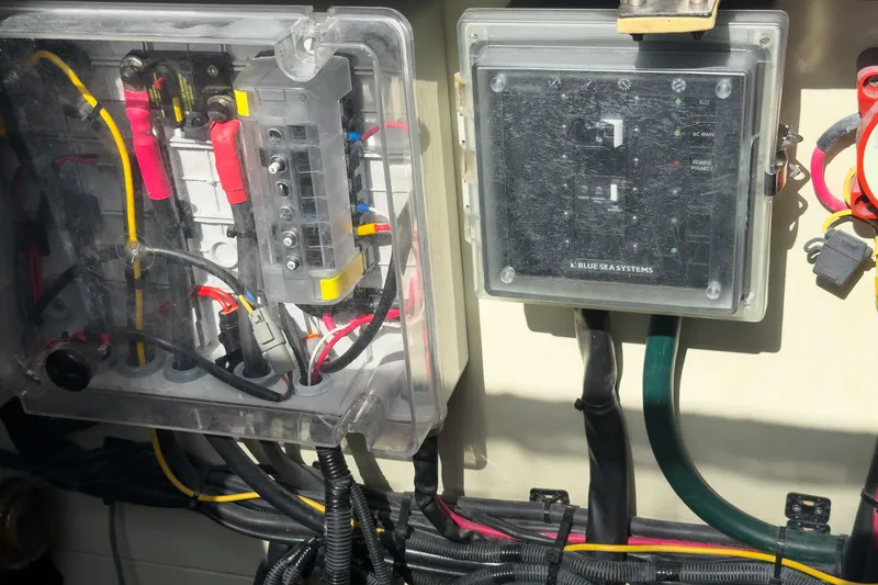 Crux Yacht Photos Pics Electrical panel on a 2017 Harvey Yachts 58, featuring Blue Sea Systems components.