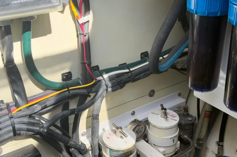 Crux Yacht Photos Pics Engine room of 2017 Harvey Yachts 58, showcasing wiring and filtration systems.