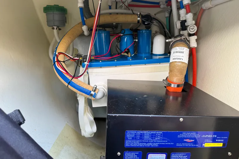 Crux Yacht Photos Pics Engine room of 2017 Harvey Yachts 58 with visible wiring and components.