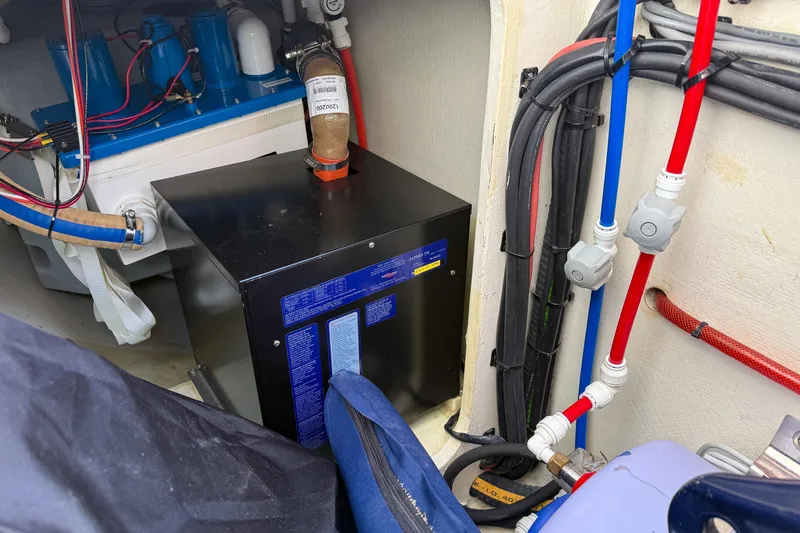 Crux Yacht Photos Pics Engine room of 2017 Harvey Yachts 58, featuring wiring and equipment.