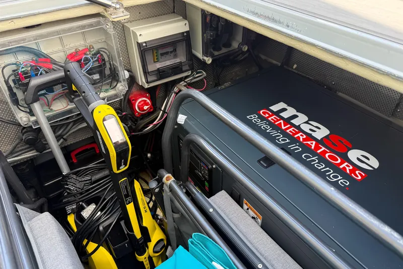 Crux Yacht Photos Pics Engine room of a 2017 Harvey Yachts 58 with Mase generator and equipment.