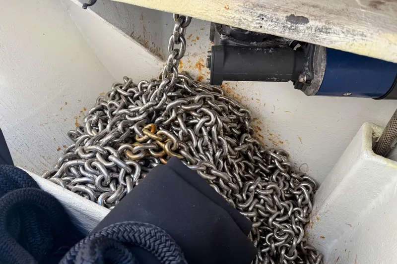 Crux Yacht Photos Pics Anchor chain storage on 2017 Harvey Yachts 58, featuring robust metal links.