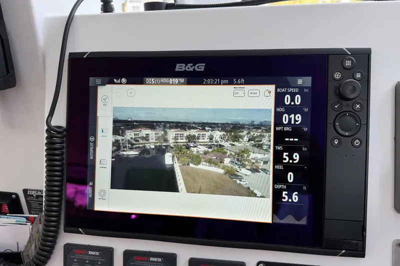 Crux Yacht Photos Pics B&G navigation display on 2017 Harvey Yachts 58, showing marina view and boat metrics.