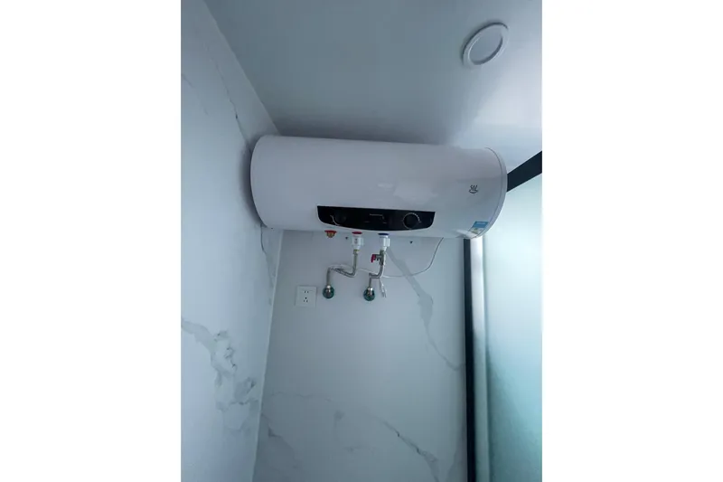  Yacht Photos Pics Modern water heater installed in a 2025 Houseboat ALLHOUSE HB-1250 bathroom.