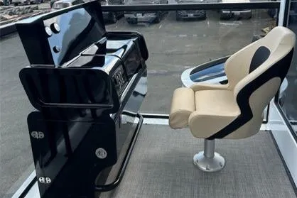  Yacht Photos Pics Modern houseboat helm with sleek black console and beige captain's chair, ALLHOUSE HB-1250, 2025 model.