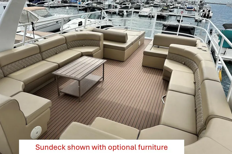  Yacht Photos Pics Luxurious 2025 custom houseboat sundeck with optional beige furniture and wooden flooring.