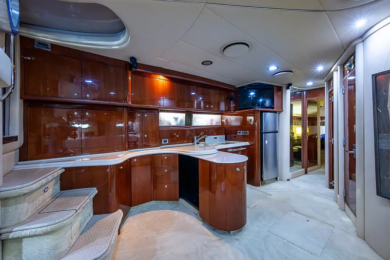 Nauti Buoy Yacht Photos Pics Luxurious interior of 2002 Sea Ray 510 Sundancer yacht with modern kitchen amenities.