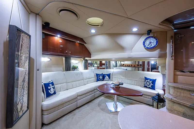 Nauti Buoy Yacht Photos Pics Luxurious interior of 2002 Sea Ray 510 Sundancer yacht with elegant seating and nautical decor.