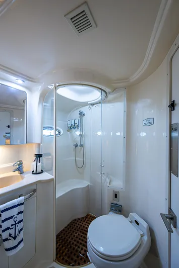 Nauti Buoy Yacht Photos Pics Luxurious bathroom in 2002 Sea Ray 510 Sundancer yacht with shower and toilet.