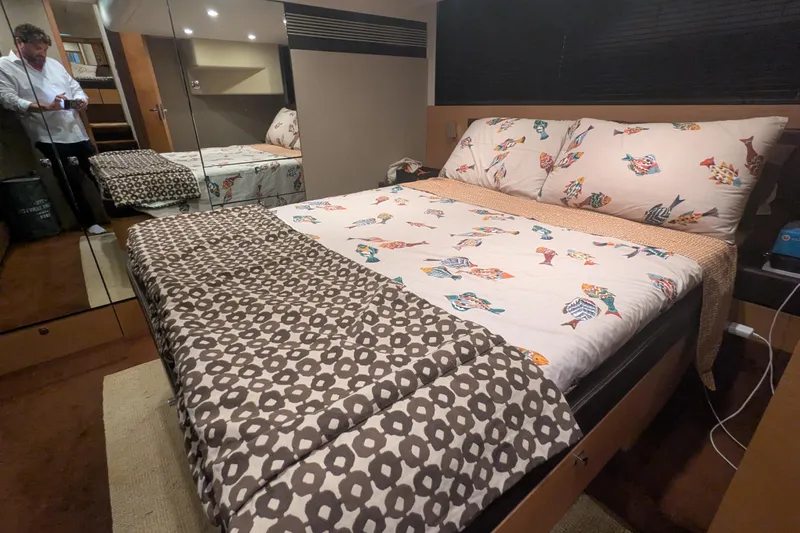  Yacht Photos Pics Luxurious bedroom interior on 2009 Fairline Squadron 55 yacht with patterned bedding.