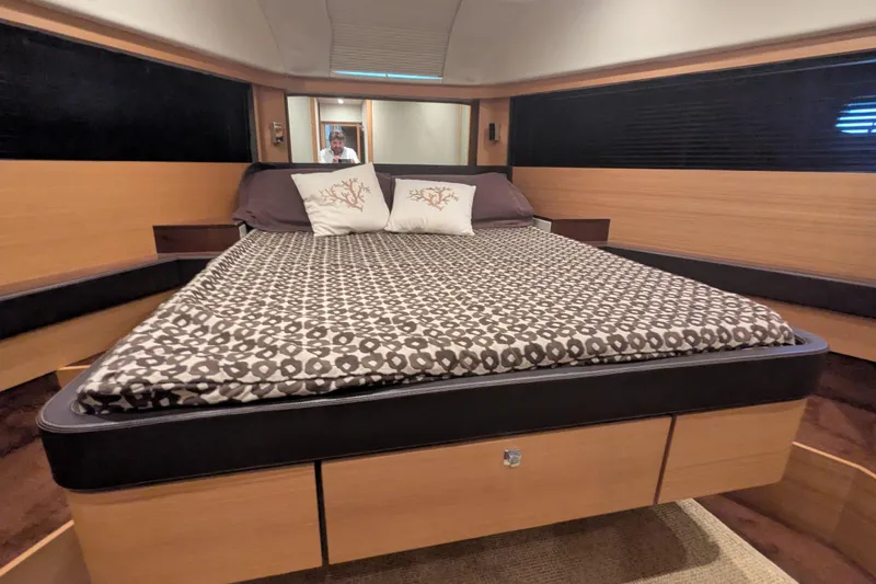  Yacht Photos Pics Luxurious bedroom interior of 2009 Fairline Squadron 55 yacht with modern design.