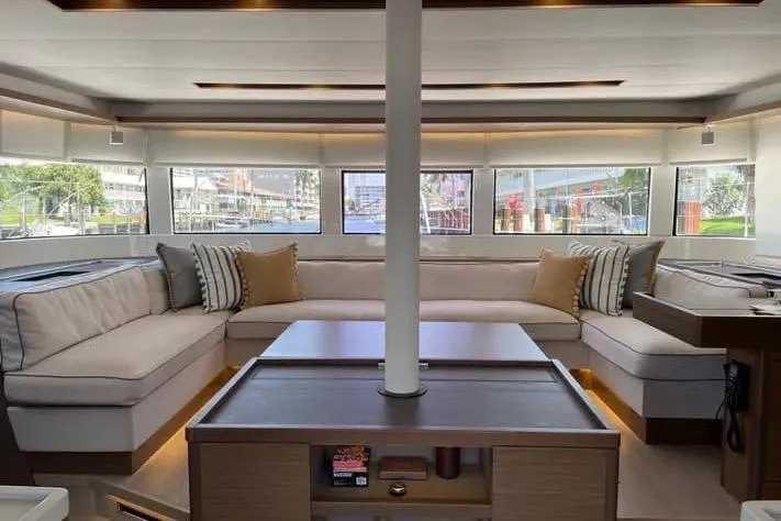  Yacht Photos Pics Luxurious interior of 2020 Lagoon 50 catamaran with spacious seating and modern design.
