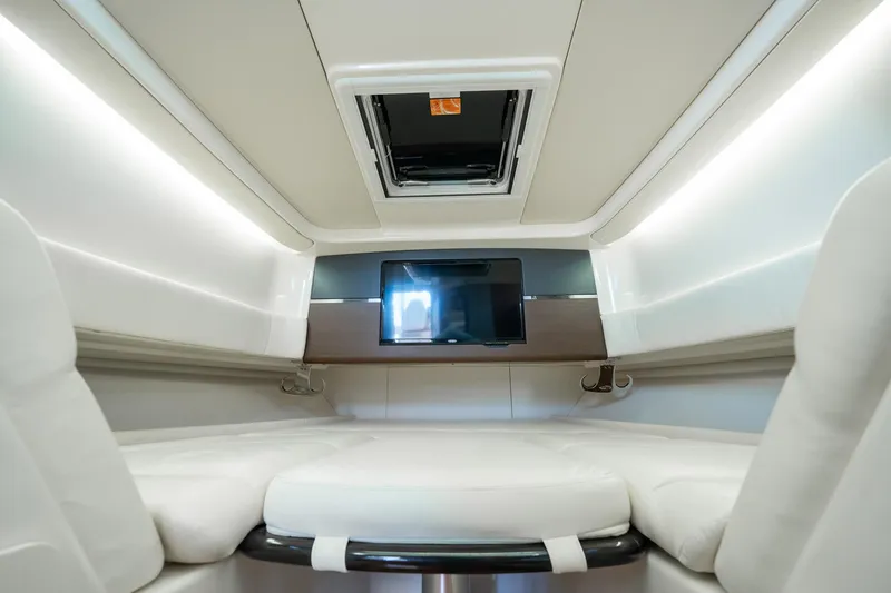 4 Reels Yacht Photos Pics 2021 Grady-White Canyon 456 cabin interior with modern design and comfortable seating.