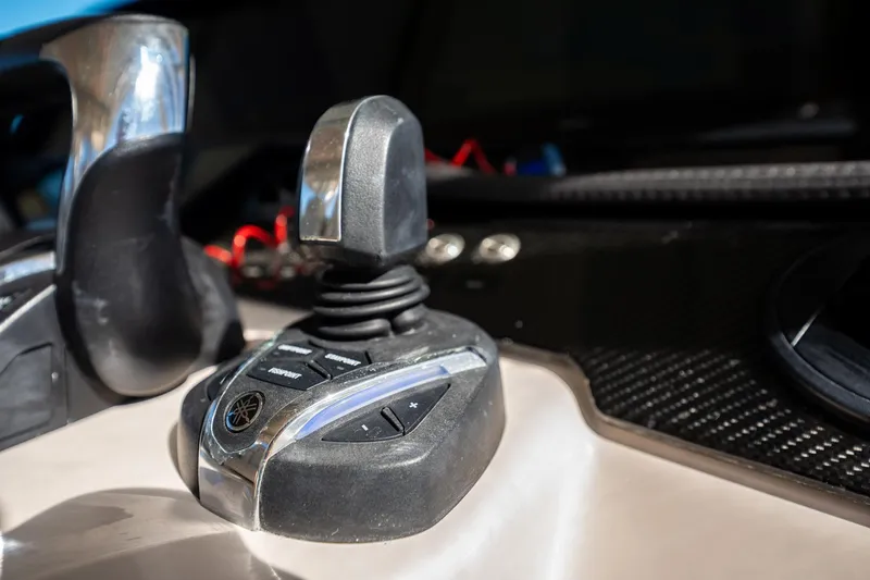 4 Reels Yacht Photos Pics Close-up of joystick controls on a 2021 Grady-White Canyon 456 boat.