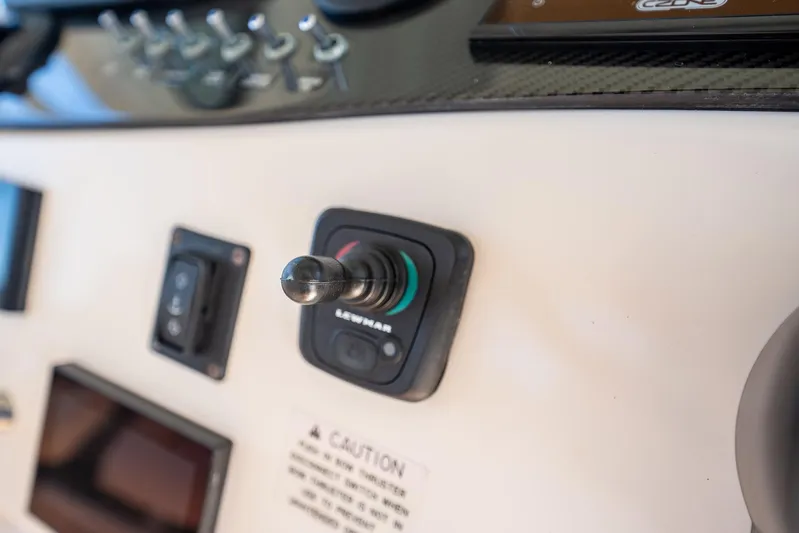 4 Reels Yacht Photos Pics Control panel of 2021 Grady-White Canyon 456 boat with switches and joystick.