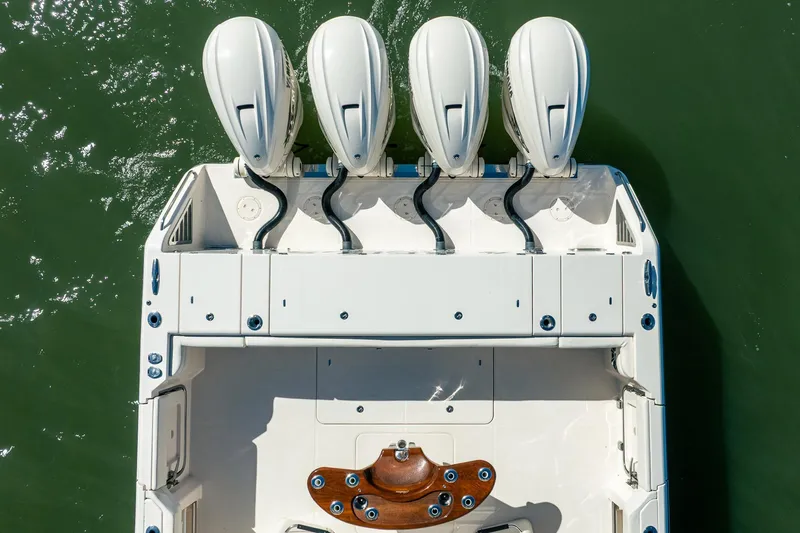 4 Reels Yacht Photos Pics Top view of 2021 Grady-White Canyon 456 boat with four powerful engines.