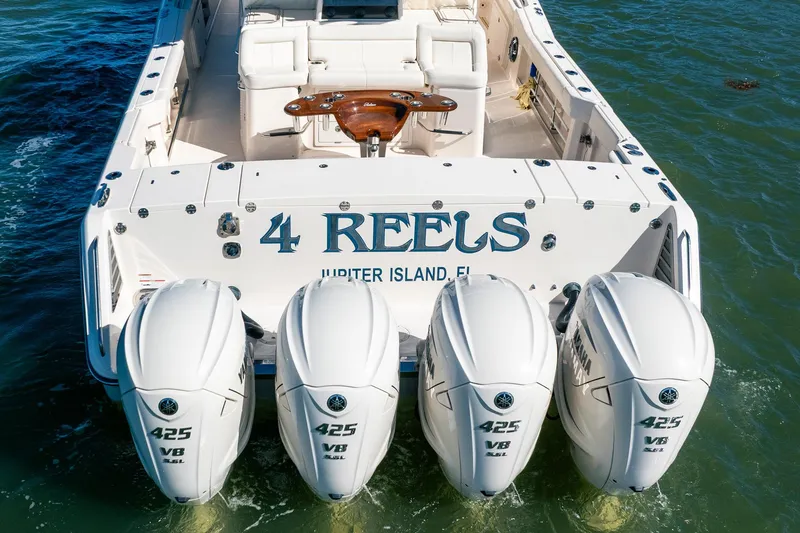 4 Reels Yacht Photos Pics 2021 Grady-White Canyon 456 boat with four Yamaha 425 V8 engines, "4 Reels" name.