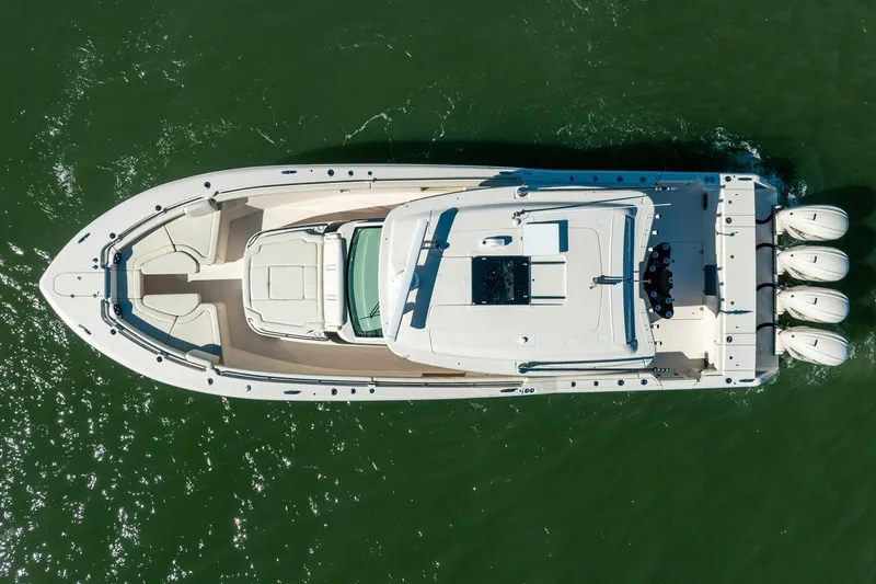 4 Reels Yacht Photos Pics Overhead view of 2021 Grady-White Canyon 456 boat on water.