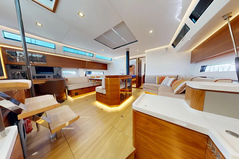  Yacht Photos Pics Luxurious interior of 2024 Amel 60 yacht with modern design and wooden finishes.