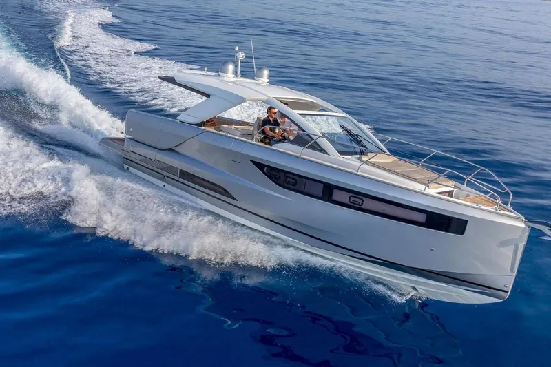  Yacht Photos Pics 2025 Jeanneau DB/43 IB yacht cruising on open water, showcasing sleek design and performance.