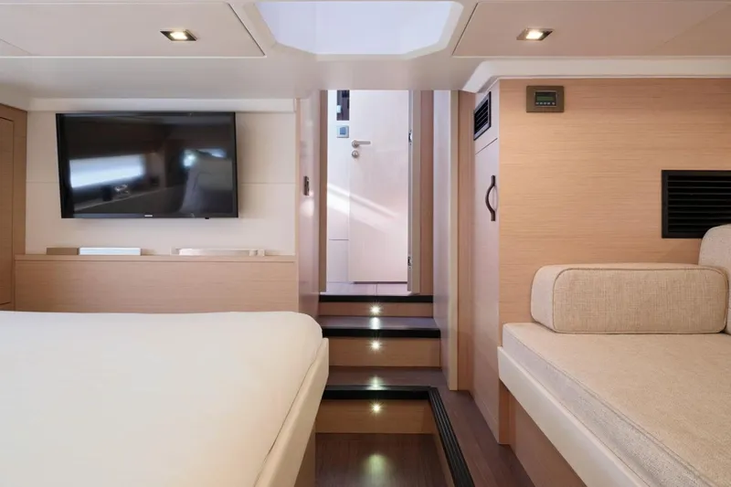  Yacht Photos Pics Interior of 2025 Jeanneau DB/43 IB yacht with modern design and cozy seating.