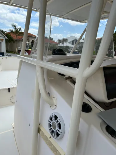  Yacht Photos Pics 2002 Grady-White 306 Bimini boat interior with speaker and console details.