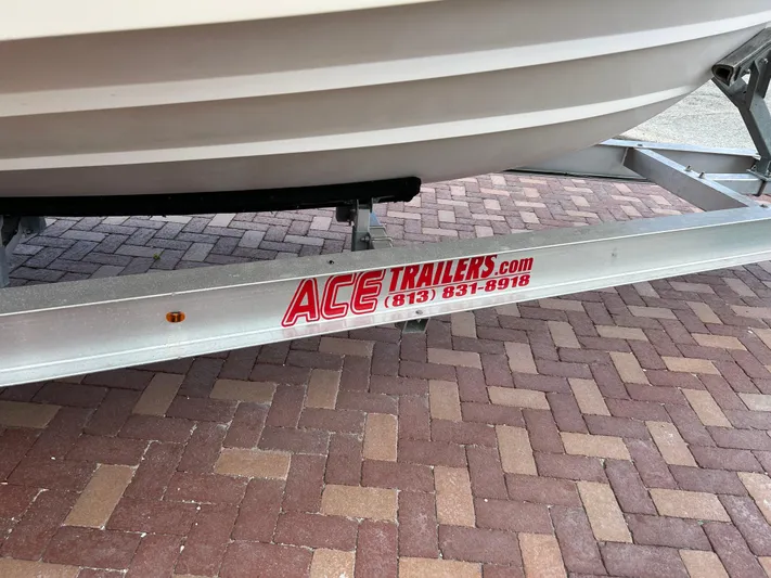  Yacht Photos Pics Trailer for 2002 Grady-White 306 Bimini, branded with Ace Trailers logo and contact number.